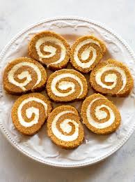This pumpkin roll recipe is soft, sweet pumpkin cake, rolled up with cream cheese frosting to create the ultimate pumpkin dessert! Pumpkin Roll Recipe The Girl Who Ate Everything