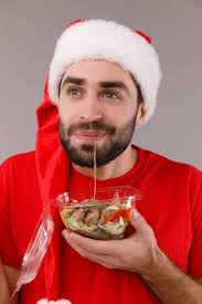 Seksi Noel adam ayakta beyaz bir arka plan üzerinde izole köknar ağacı  yakınındaki. — Stok Foto © alfa4studio #170295672