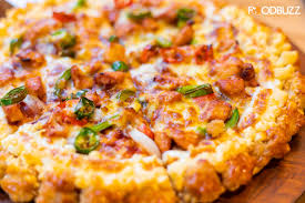 Now your delicious pizza is ready to enjoy… Hop On The Fried Chicken Trend With Satisfying Chicken Crust At Pizza Company