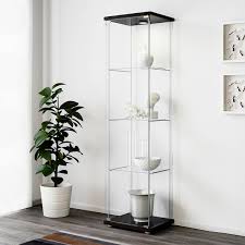 The top space is 14.5 inches, the middle space is 10.5inches, and the lower. Detolf Glass Door Cabinet Black Brown 16 3 4x64 1 8 Ikea