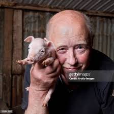 642 Man Holding Pig Stock Photos, High-Res Pictures, and Images