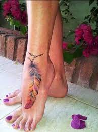 Watercolor Feather Tattoo Ideas On Foot For Women At Mybodiart Com Anklet Ankle Wrap Around Chain Indian Tribal Rainbow Tattoos Feather Tattoos Foot Tattoos