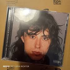 This is Forrest Avery LeMaire aka Mr.Kitty . His music detracts wounds you  didn't know you have and heals them. I love this beautiful human being and  his work so much 💛