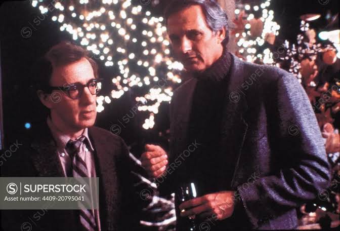WOODY ALLEN and ALAN ALDA in CRIMES AND MISDEMEANORS (1989), directed by  WOODY ALLEN. - SuperStock