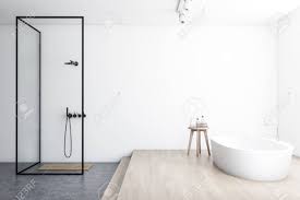 This shower room does not only look amazing, but it also has a special design. Side View Of Modern Bathroom With White Walls Concrete And Wooden Stock Photo Picture And Royalty Free Image Image 129260141