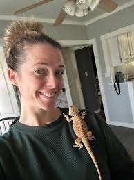 I have so many questions how do I get my bearded dragon to like me ?