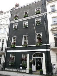 The brick, while complementary in tone aimed to. Black Brick Brick Exterior House House Paint Exterior Exterior Brick