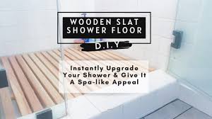 In this shower, the tiles are successfully used to create a rustic appearance by combining teal and white tiles and the appearance of distressed wooden planks. Easy Bathroom Upgrade Diy Wooden Slat Shower Floor Ideas For Your Bathroom Shower Youtube