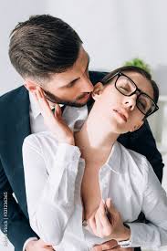 businessman kissing attractive secretary with big breast in office Stock  Photo | Adobe Stock