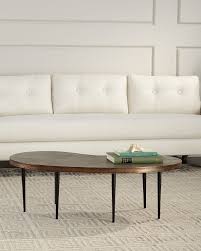 This box frame coffee table is a blank slate, its glass surface the perfect platform for showcasing your most coveted collectibles. Arteriors Sloan Short Coffee Table Neiman Marcus