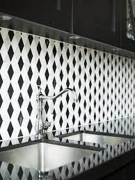 Black And White Trellis Pattern Mosaic Tile On A Kitchen Backplash See Cococozy Kitche Black And White Backsplash Black White Kitchen Patterned Kitchen Tiles