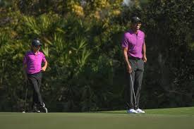 At age 11, charlie woods, son of champion golfer tiger woods, is already out in front when it comes to following quite literally. Tiger Woods Beams Over Son Charlie S Impressive Performance At Pnc Championship Entertainment Tonight