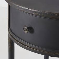 Black bedside table, asta sq wooden bedside table offers convenient storage but in a simple chic affair to give your bedroom a timeless features: Round Black Metal 1 Drawer Bedside Table Alienor Maisons Du Monde