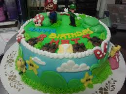 We love seeing all kinds of submissions! Mario Brothers Collectible Figurines With Buttercream Decorations On A 9 Round Cake Front View Mario Cake Cake Cake Decorating