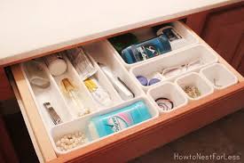 A single base cabinet comprised of a drawer opening and a larger cabinet opening with a single or set of doors. Bathroom Vanity Organization How To Nest For Less