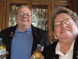 Friends Clive and Lorraine Hatch drinking the toast for the birthday boys  and girls