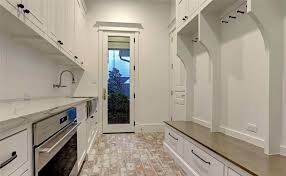 This kitchen is definitely more coastal than farmhouse, but it has some farmhouse elements! Red Brick In The Kitchen Gambrick