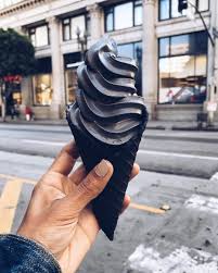 Black And White Ice Cream Cone Real This All Black Charcoal Ice Cream Matches Your Cold Dark Soul Will Probably Stain Your Entire Mouth And Li Black Ice Cream Charcoal Ice Cream Ice Cream Shop