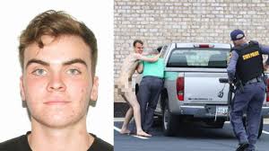 Man wanted in triple homicide in custody after naked foot chase