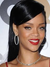 Side swept curls are very elegant and easy to achieve. New Pictures Of Rihanna With Her Long Straight Black Hairstyle With Very Long Side Bangs