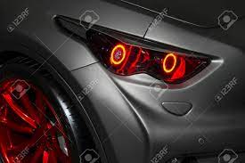 Matte paint is super fragile and not at all durable. Predatory Car Headlight With Red Lights And Hood Of Powerful Stock Photo Picture And Royalty Free Image Image 66533525