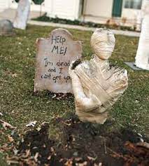 If your yard is looking a little plain, then it's time to spookify it with our selection of our outdoor halloween decorations. Mummy Yard Decor Halloween Diy Outdoor Halloween Decorations Diy Outdoor Outdoor Halloween