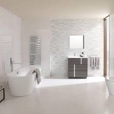 Tile is often the most used material in the bathroom — so choosing the right one is an easy way to kick up your bathroom's style. Shine Platino Spanish Tiles By Porcelanosa Bathroom Design Family Bathroom Design Bathroom Interior Design