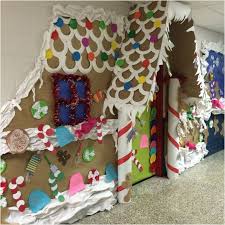 Christmas door decorating contest gingerbread house. Gingerbread House Door Decoration Ideas Homenthusiastic Christmas Cubicle Decorations Office Christmas Decorations Christmas Door Decorating Contest