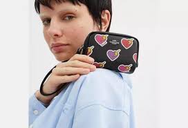 NWT Coach Pouch Wristlet With Heart Bolt Print