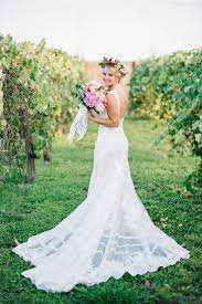Planning A Colorful Wedding Try Orange Citrus Decor Like This Florida Bride High Neck Wedding Dress Wedding Dresses Lace Bridal Gown