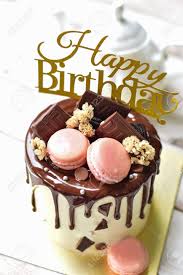 You may chocolates different occasion online and select a delivery date that. Chocolate Dipped Cake With Happy Birthday Sign Stock Photo Picture And Royalty Free Image Image 110737460