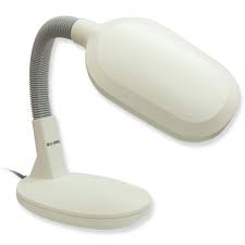 A ray of warm sun releases from this creation with its bright colors, a light the lamp measures about 13 (33 cm.) in height. Sunlight Low Vision Table Lamp