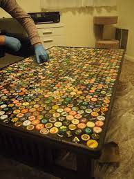 Bottle cap projects bottle crafts bottle top tables beer cap table diy furniture flip crafts to make diy crafts bottle cap art beer caps. 1 320 Bottle Cap Coffee Table Beer Cap Table Beer Cap Art Bottle Cap Table
