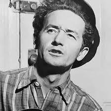 It's a folk singer's job to comfort disturbed people and to disturb  comfortable people." — Woody Guthrie The world's a better place because you  were here. Happy 113th Birthday, Woody Guthrie. 🧡 #