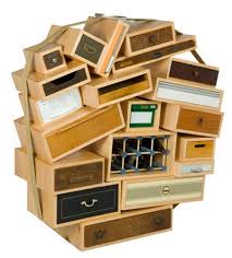 Chest of drawers composed of many square wooden drawers with japanese lettering. Chest Of Drawers Tejo Remy Droog Design Markanto
