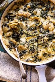 Skillet Baked Creamy Pesto Spinach And Artichoke Gnocchi Half Baked Harvest Recipe Half Baked Harvest Recipes Pesto Spinach Creamy Pesto