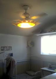 First mount lysboj lamps without the shades on the ceiling and wire them together in a row with 4. Smila Sol Ceiling Fan Ikea Hackers