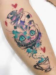 Cheshire Cat Alice In Wonderland Inspired Small Flower Tattoos White Background Wonderland Tattoo Mad Hatter Tattoo Disney Tattoos