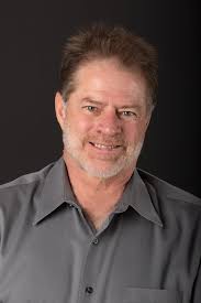 Location of airbag control module in 1993 NA automatic?