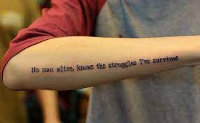 Elegant Lyrics Tattoo Quotes On Forearm No Man Alive Knows The Struggles I Ve Survived Tattoo Quotes Lyrics Tattoo Text Tattoo