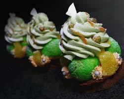 Crispy Choux Puffs With Pistachio Mascarpone Chantilly On Chocolate Sable Breton With Pistachio Mousseline And Orange Caramel Holiday Choux Tartelettes Swee Winter Desserts Orange Caramel Sweetarts