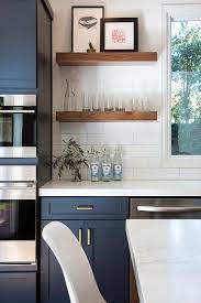 Backsplash and cabinet designs for blue color granite countertops. Navy Blue Kitchen With Floating Shelves Transitional Kitchen Kitchen Remodel Small Home Kitchens Kitchen Design