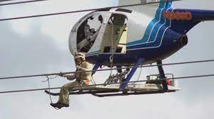 How to become a helicopter lineman. Meet The Chainsaw Wielding Flying Linemen Who Help Keep Your Power On