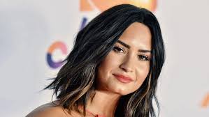 God is not the product of human invention. Demi Lovato Being Baptized In Israel Filled God Sized Hole In My Heart Cbn News