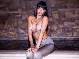 Rihanna strips off as she posts ANOTHER set of sizzling holiday snaps -  Mirror Online