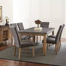 Debby 7 Piece Dining Set In Driftwood With Gray Chairs Nebraska Furniture Mart Round Dining Room Table Round Dining Room Side Chairs Dining