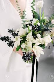 4.8 out of 5 stars 6,513. Beautiful Modern Wedding Bouquet In The Hands Of The Bride Black Stock Photo Picture And Royalty Free Image Image 145247145