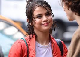 Woody and Selena Gomez talking between takes during the filming of “A Rainy  Day In New York”, which will be playing in select theaters starting  tomorrow.