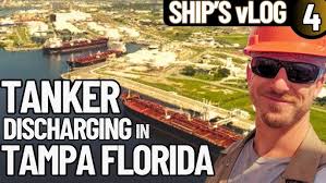 New cars rolling off cargo ship at Houston Ship Channel