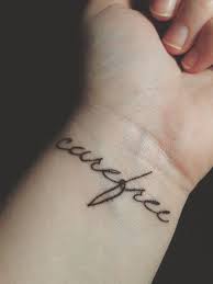 Carefree Tattoo Meaningful Wrist Tattoos Word Tattoos Wrist Tattoos Words